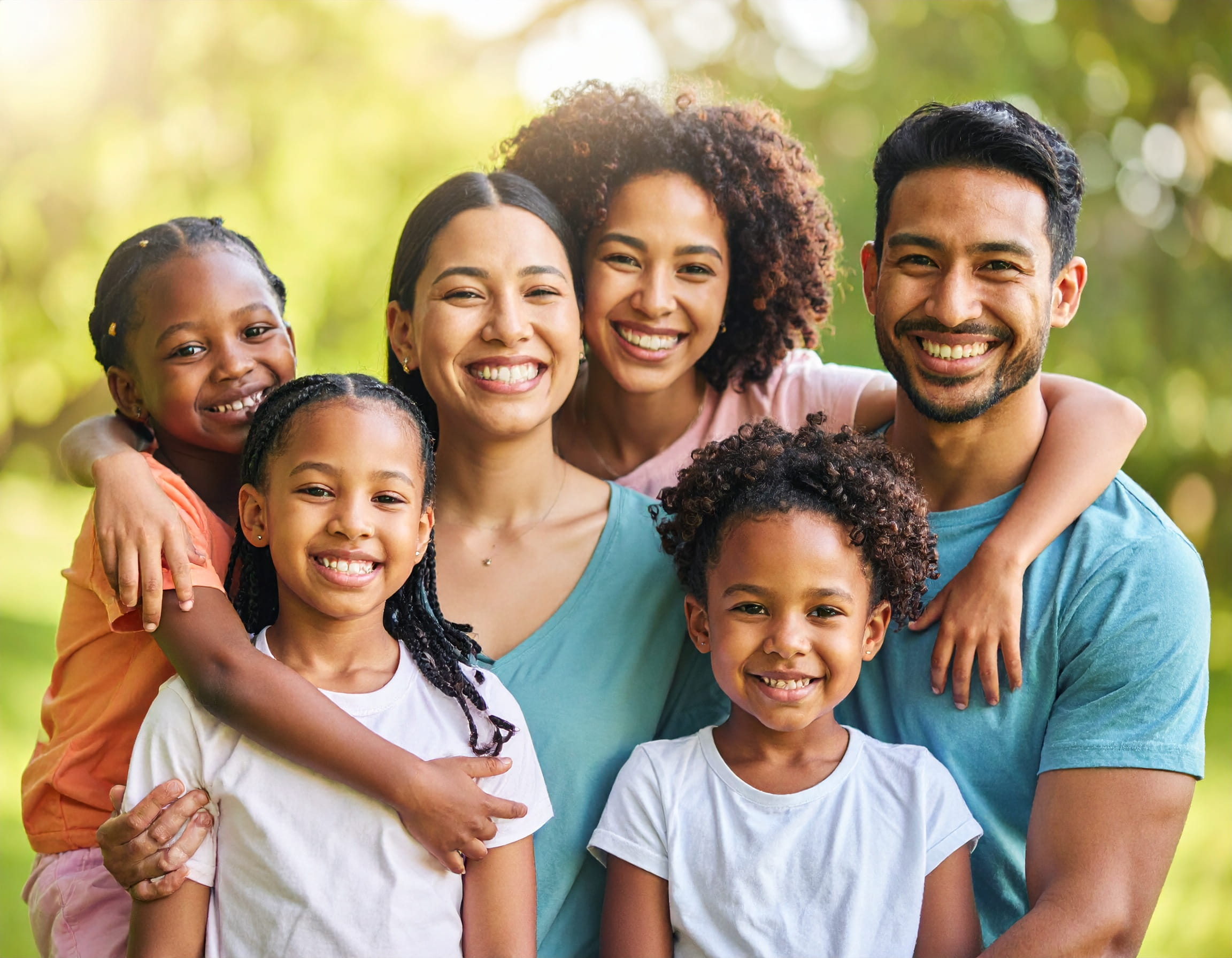 Diverse family photo with adults and children