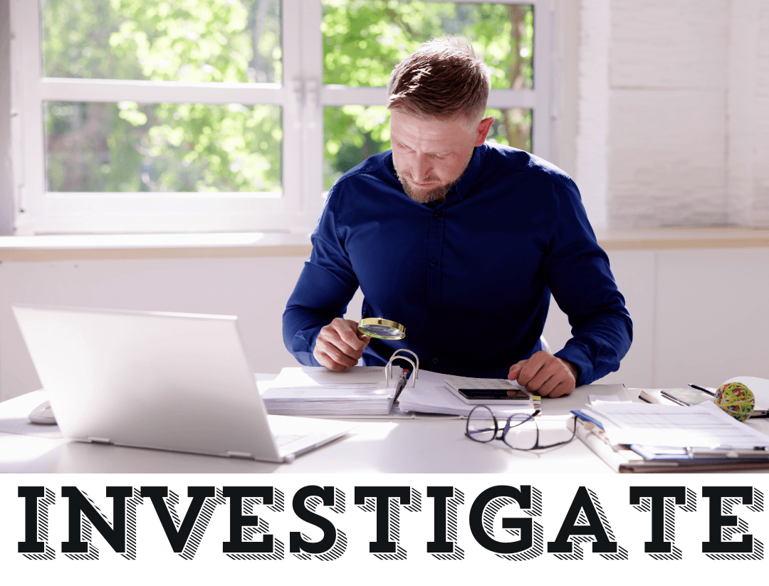 A man with a computer and papers over the word Investigate