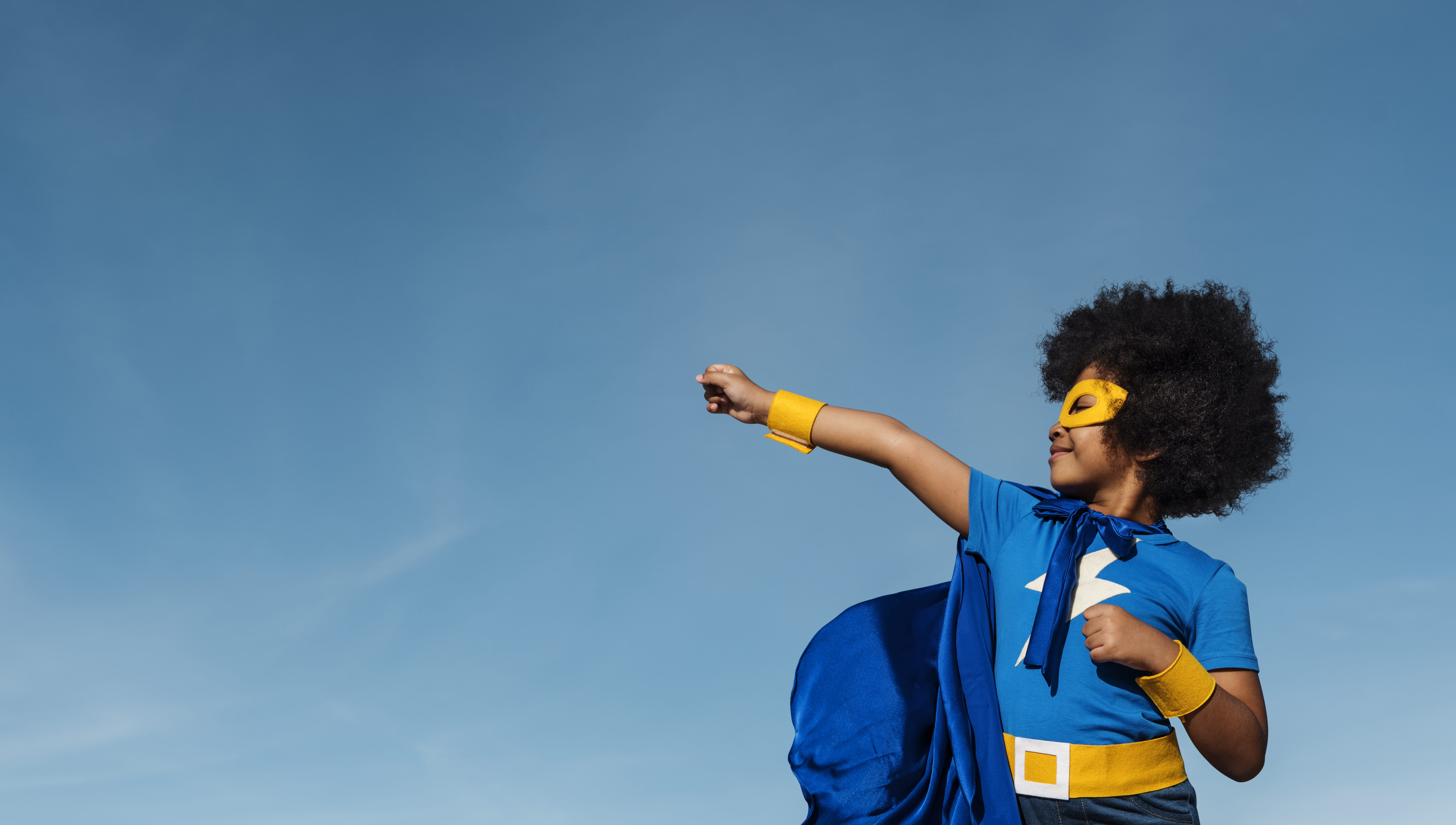 Girl in a superhero costume