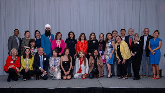 members of The MAAPAC Advocacy Strategic Initiative Group posing on conference stage