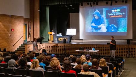 OK2SAY Presenter giving speech at School in front of student audience