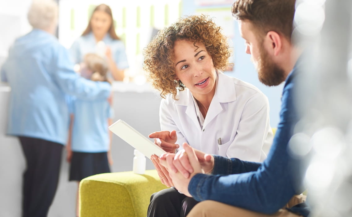Image of patient and doctor conversation