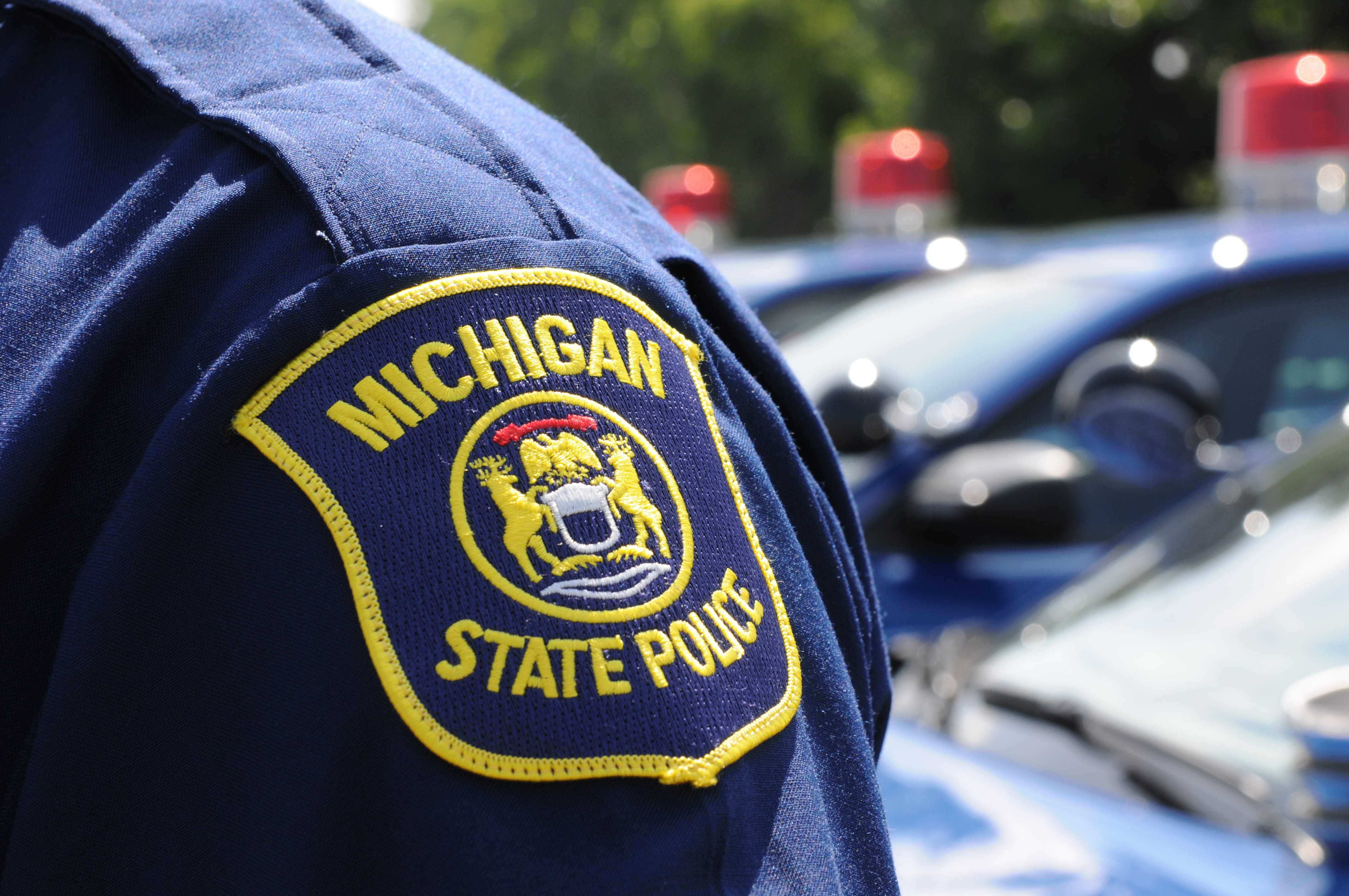 Closeup of an officer's Michigan State Police Patch on their left shoulder. 