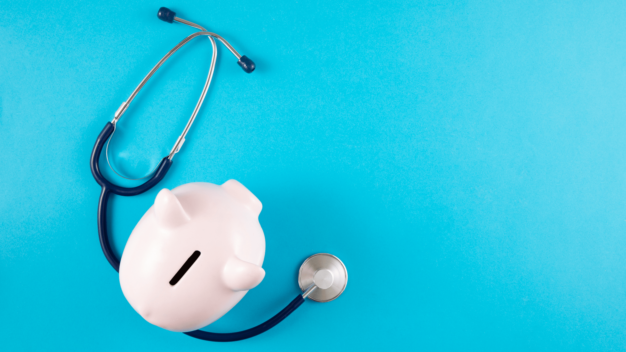 Piggy bank and stethoscope
