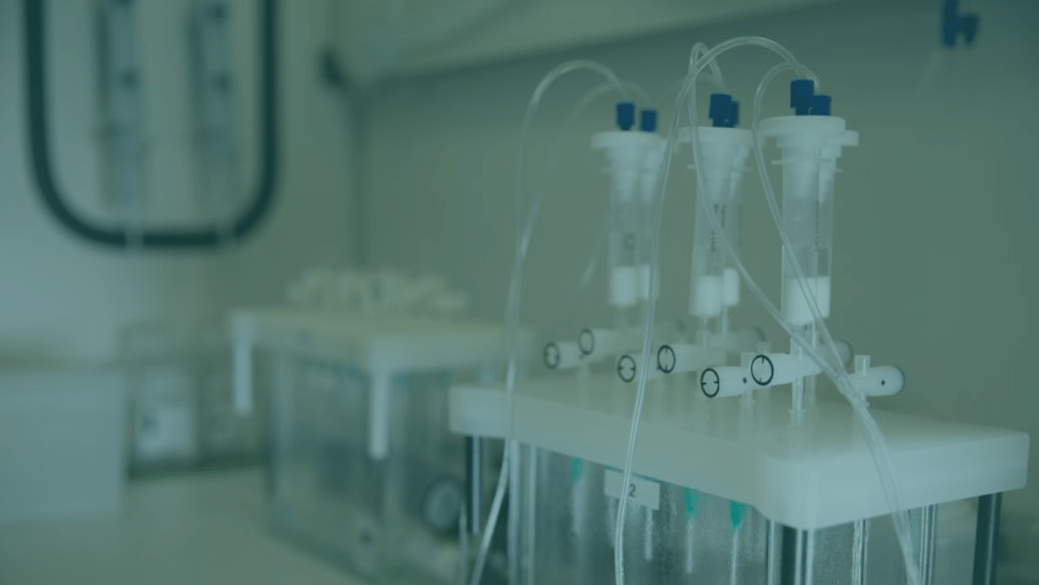 A setup of PFAS testing equipment, with a teal overlay
