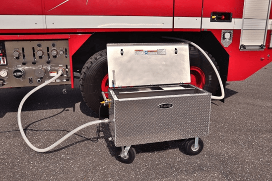 a mechanical device hooked up to a fire truck