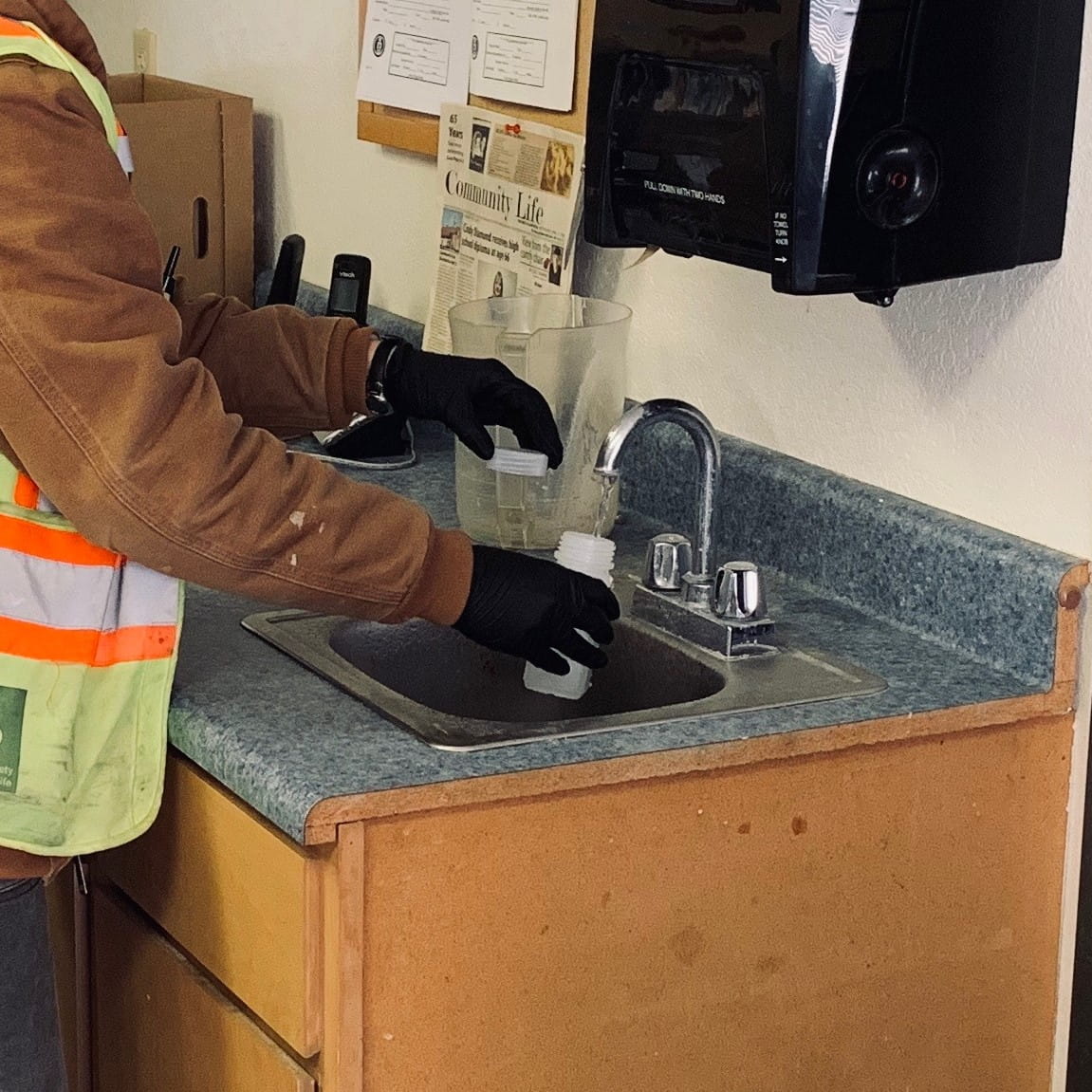 Taking a sample at a home faucet