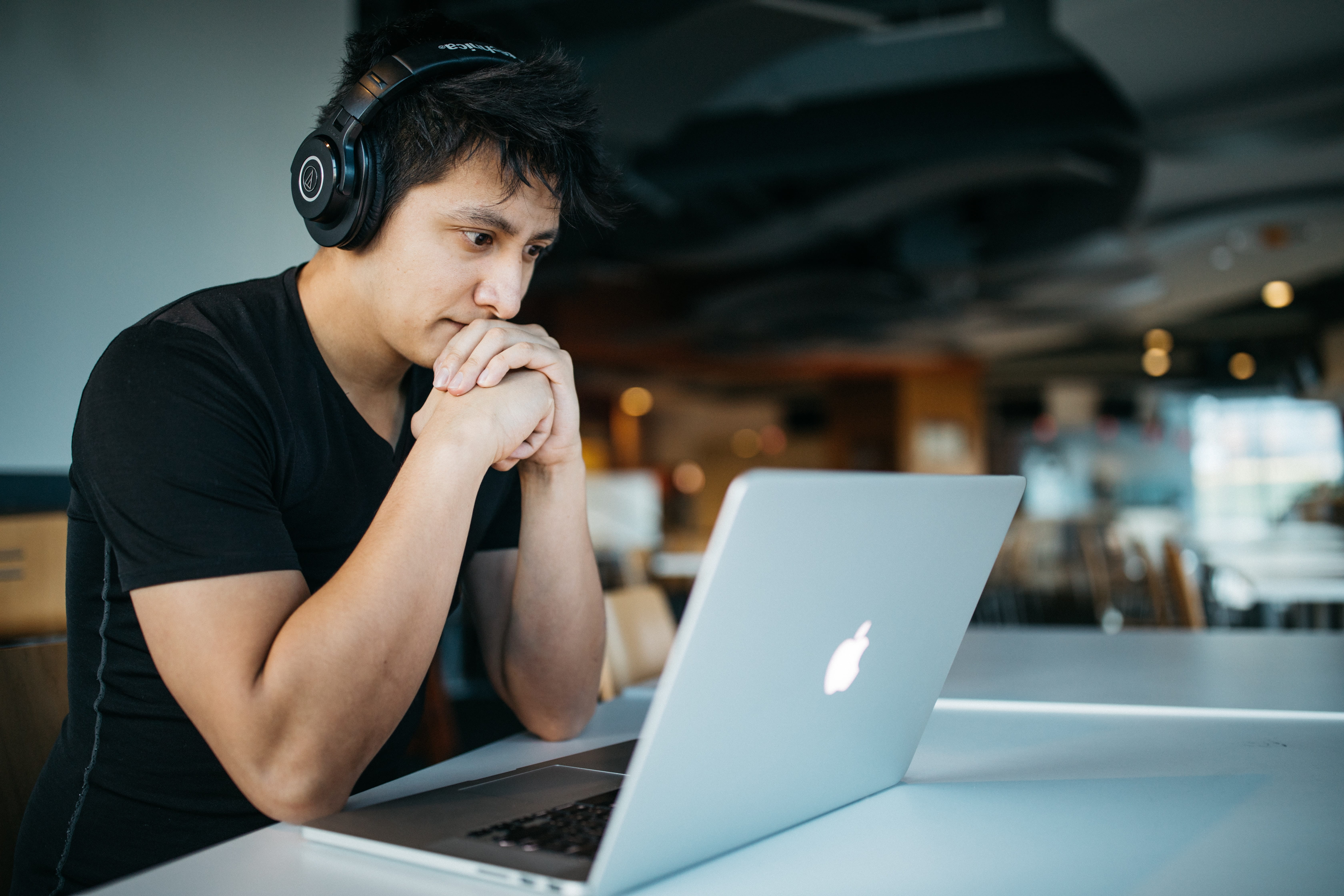 A guy working on a computer.