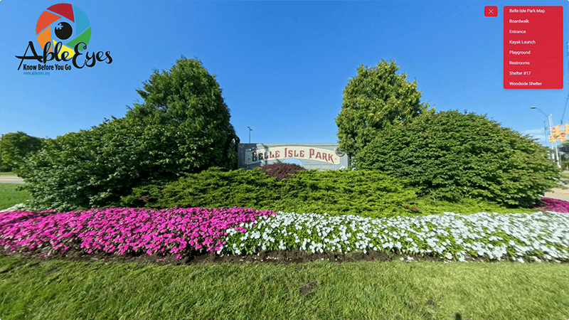 The Belle Isle Park Sign surrounded by flowering annuals