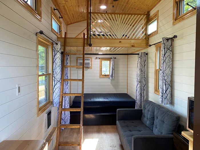 Interior view with couch loft and ladder