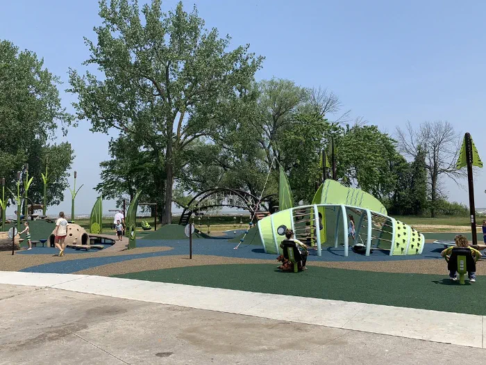 playground sitting on a rubberized surface