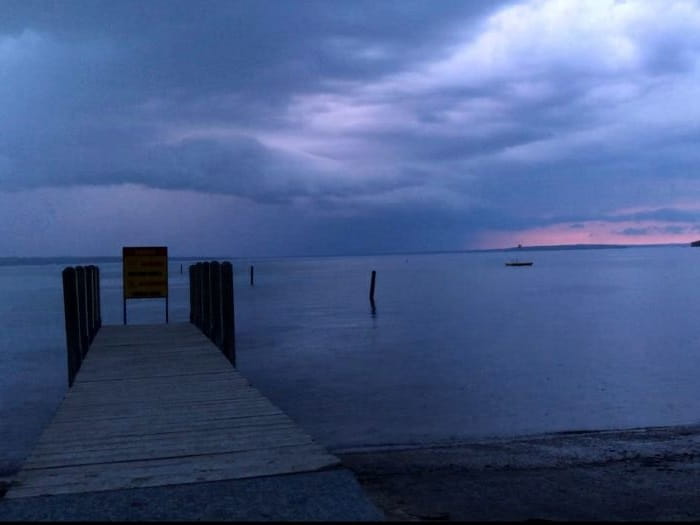 storm clouds above boating access site at Burt Lake