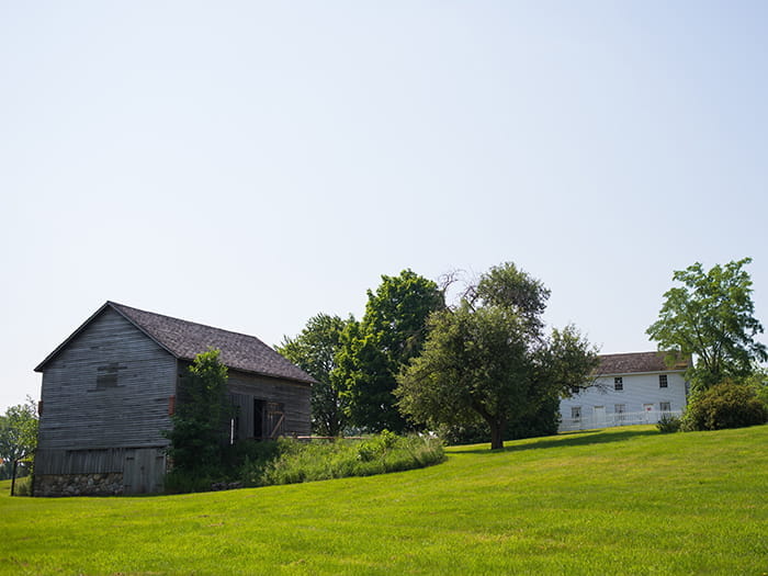 two historic buildings on hillside
