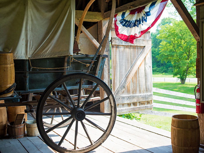 side view of buggy inside historic barn