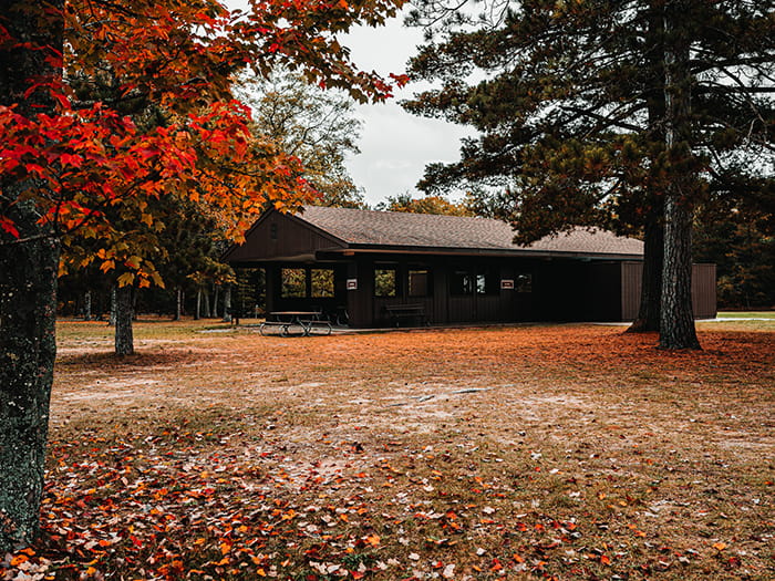 wood sided picnic shelter