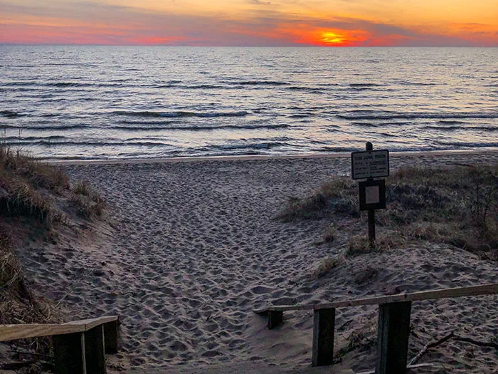 Hoffmaster  beach at sunset by Greg Viau