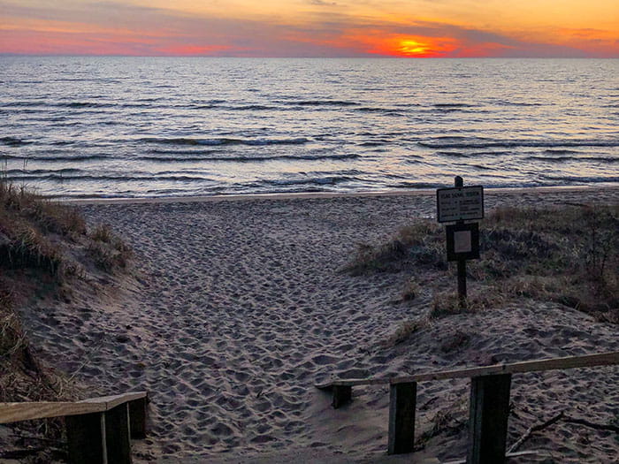 Hoffmaster  beach at sunset by Greg Viau