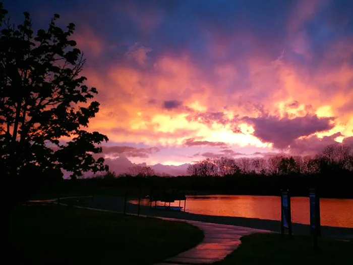 orange and pink sunset over water