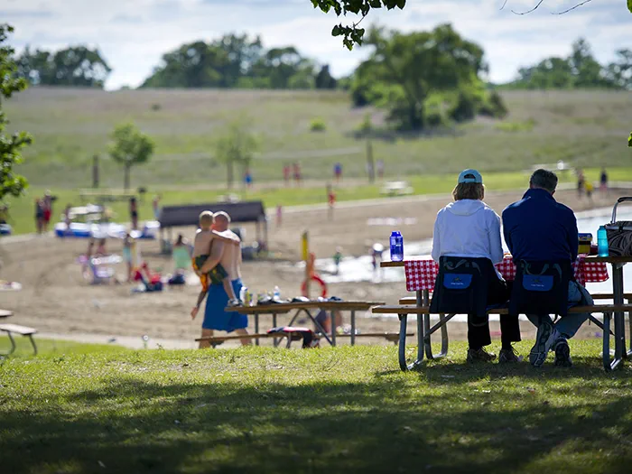 picnickers looking out at beach