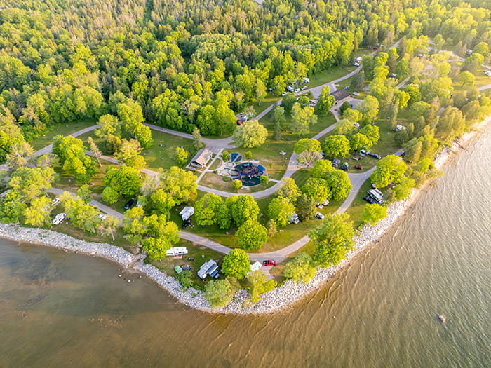 birds eye view of campground roads and water
