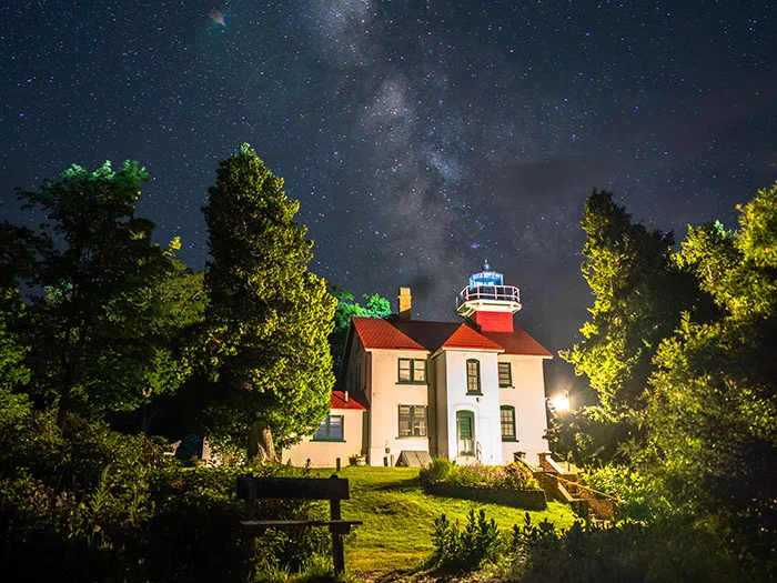 Lighthouse lit up at night