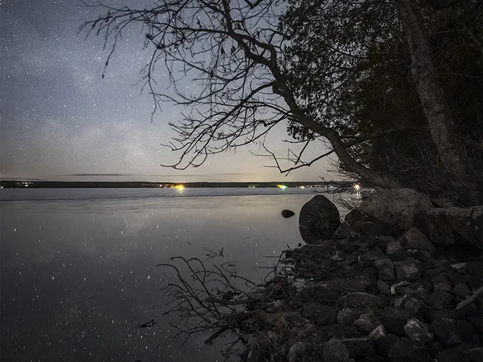 starry sky above lake