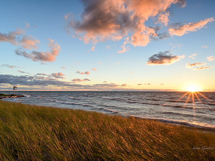 Ludington light on the dune by Sarah Goodwin sgcaptures