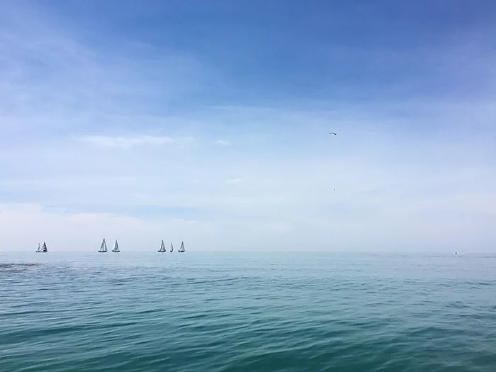 sailboats on water by photographer Jamie Ball
