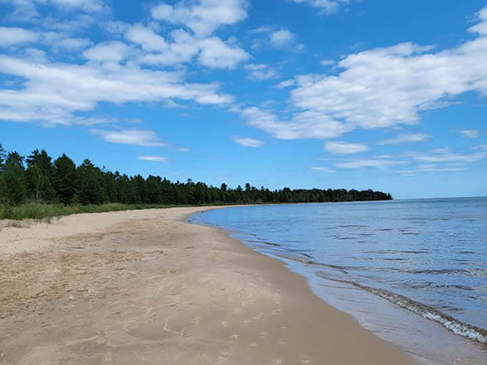 blue sky over shoreline