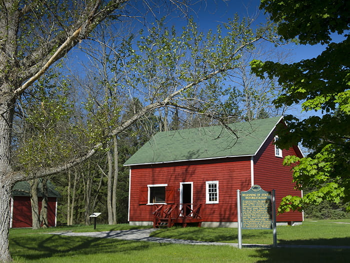 red barn with historic sign