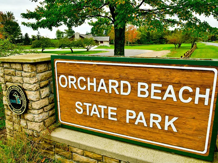park sign reading Orchard Beach State Park