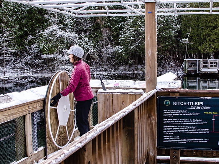 visitor propelling raft with wheel