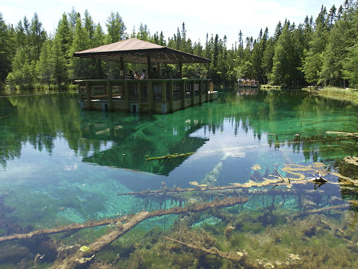 raft with blue green water surrounding raft
