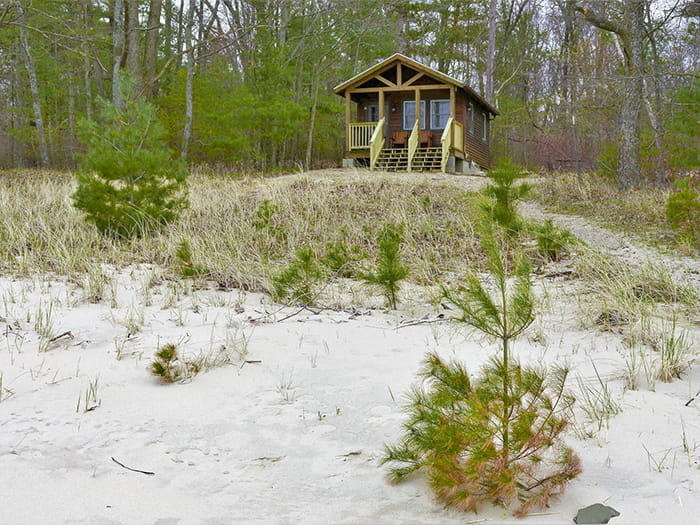 cabin on snowy hill photo by Karen Allmond