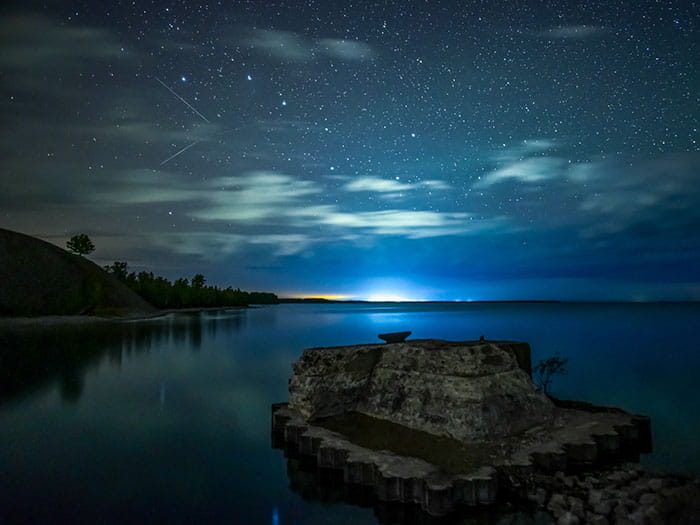A long exposure photograph of the night sky at Rockport Recreation area