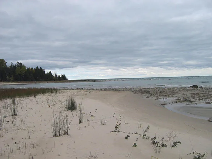 A sandy portion of beach along the Lake Huron shoreline at Rockford Recreation Area