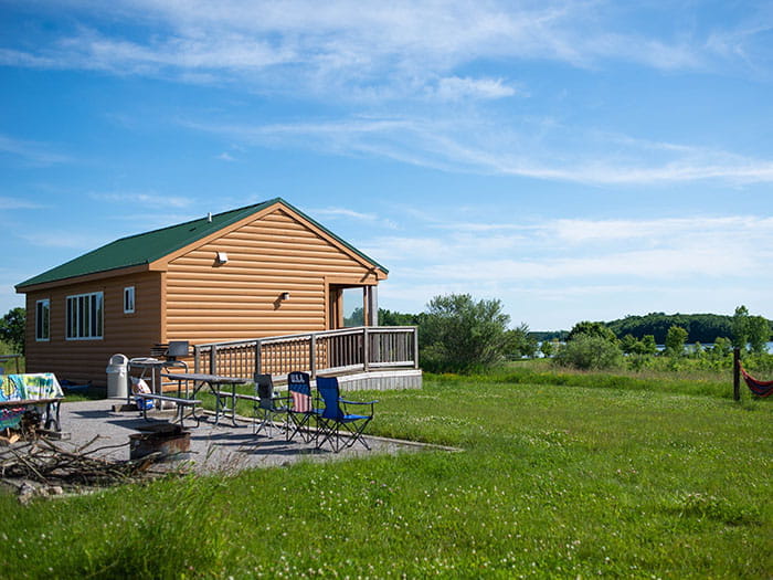 wood-sided cabin with ramp
