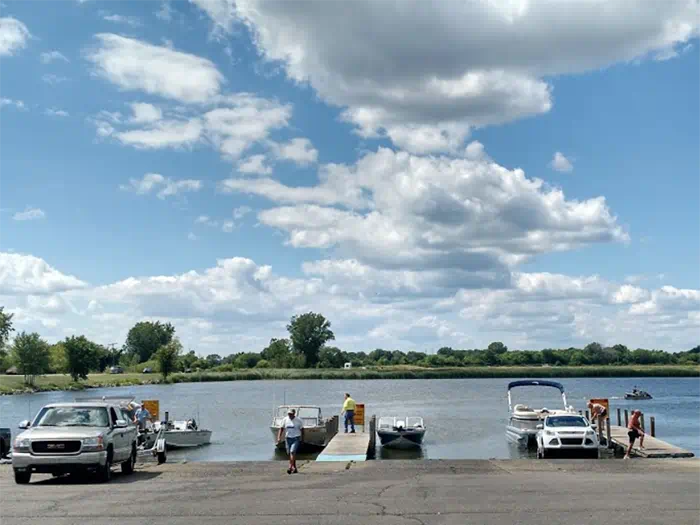 three skid piers with boats and vehicles
