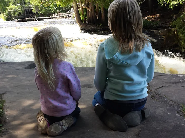 Girls looking at falls