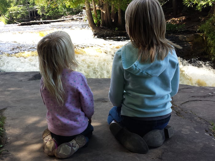 Girls looking at falls