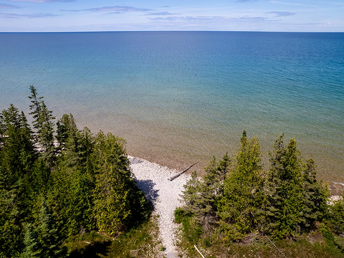 hard-packed path through trees to Lake Huron