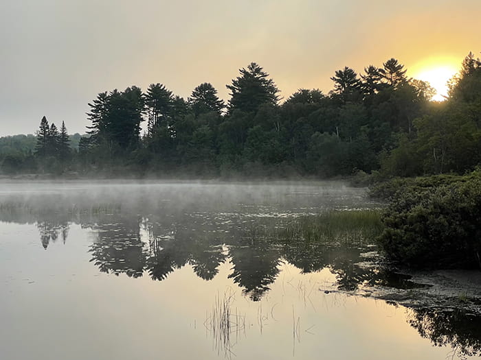 lake with sun rising