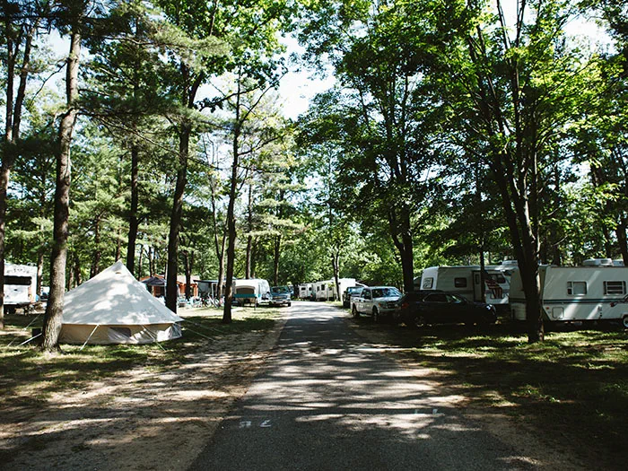 Wilson State Park campground loop with tents and campers