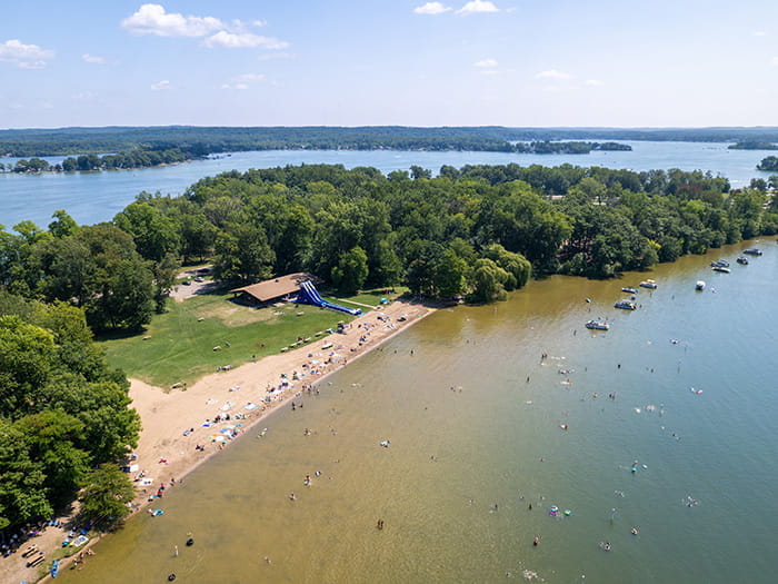 Aerial view of the day use are and beach at Gun Lake in Yankee Springs recreation area