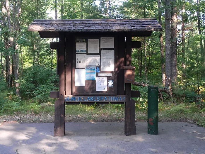 An information kiosk at the beginning of the Muncie Lake Pathway
