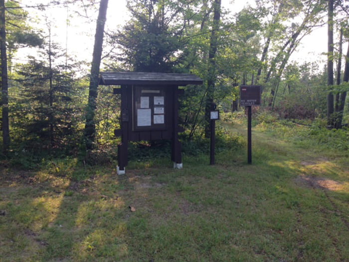 An info kiosk at the trailhead of the Tisdale Triangle Pathway