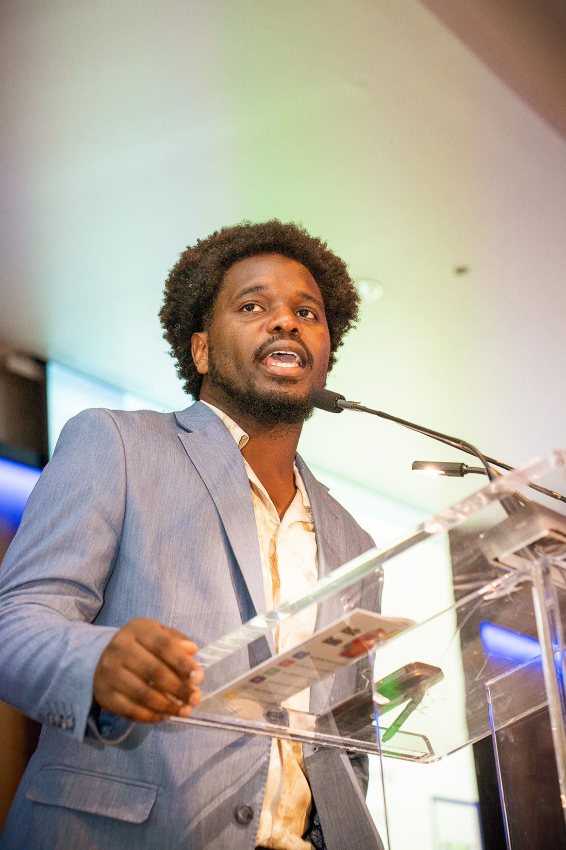 A presenter at the podium, speaking to Gala attendees