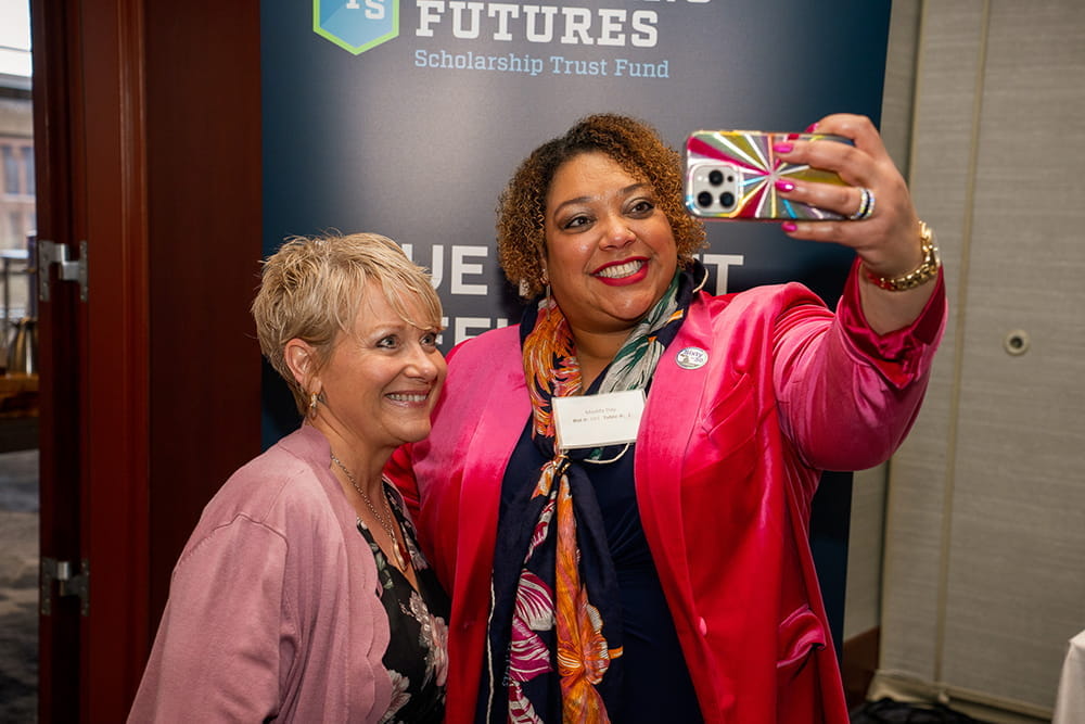 Two women take a selfie at the Gala.