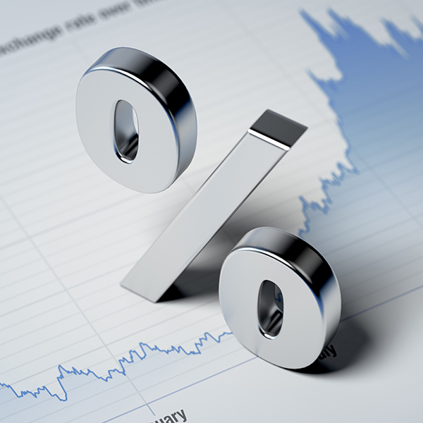 3D image of a percent sign over a paper business graph