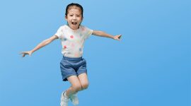 Photo of young girl jumping in the air